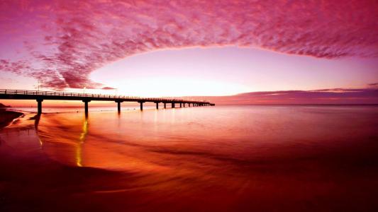 桃红色海滩日落