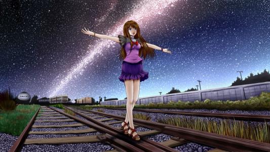 女孩走在铁路上